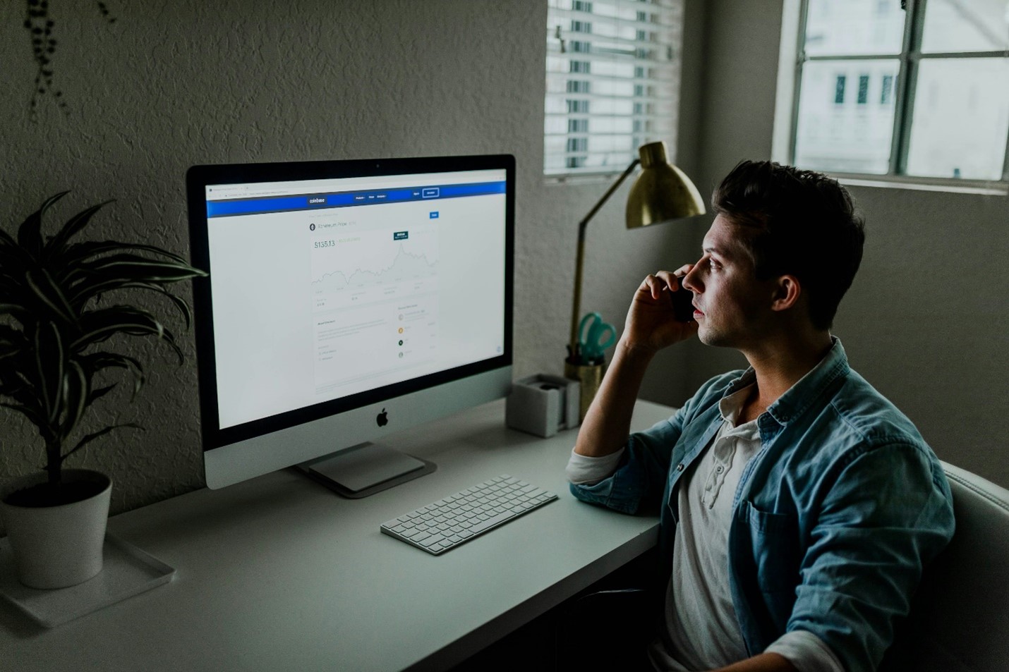 A virtual assistant speaking with a client on the phone.