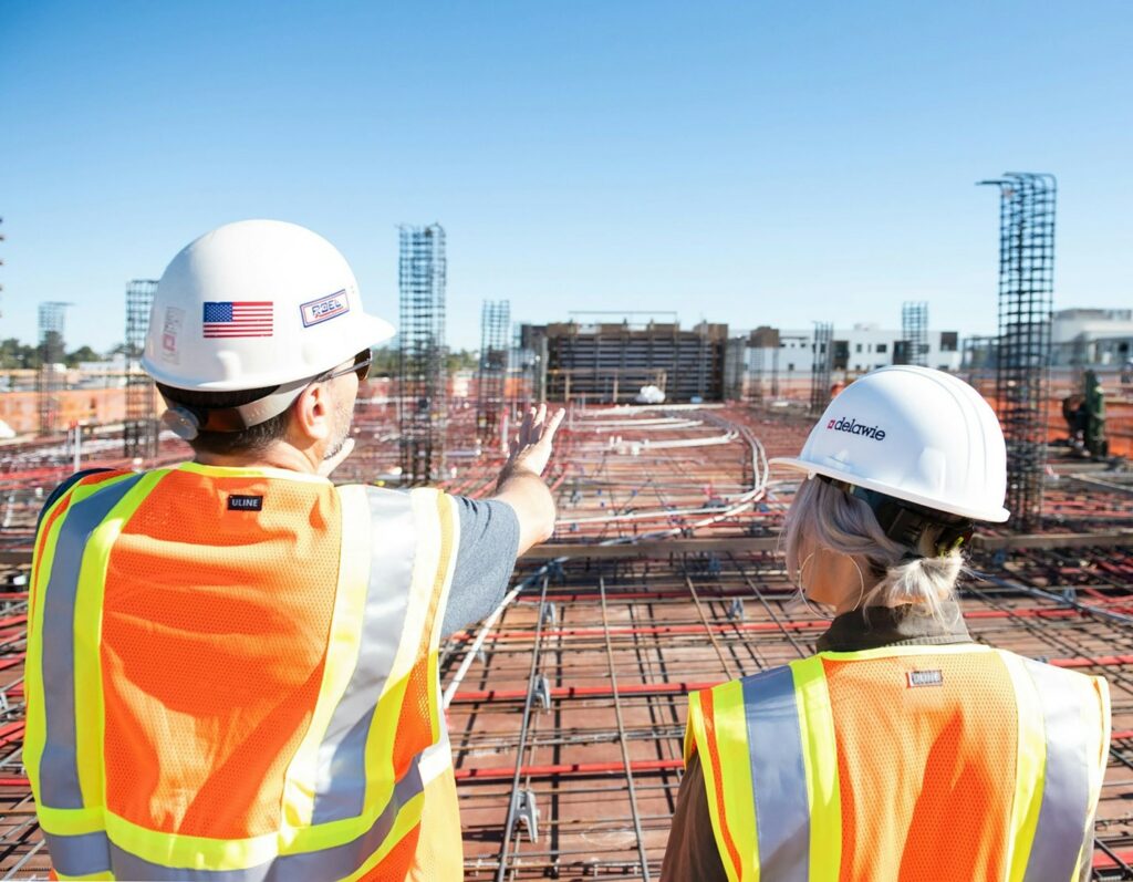 A construction crew looking over a project.