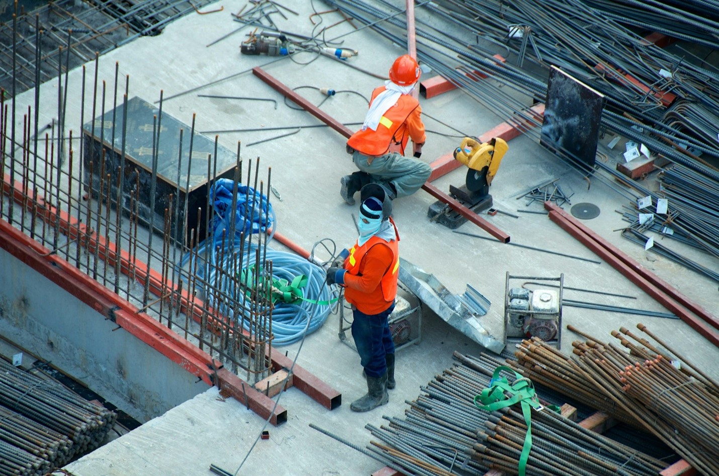 Construction workers in action on a job site.