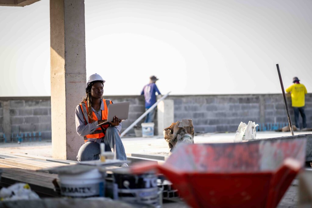 Engineer technician inspects building structure Engineer technicians are looking at and analyzing unfinished construction projects. In order to be in accordance with the design