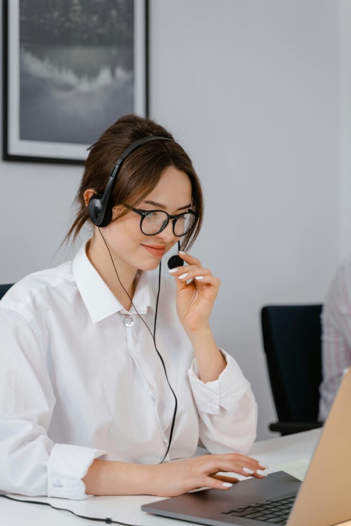 A construction admin assistant talking in a virtual meeting with their manager. 