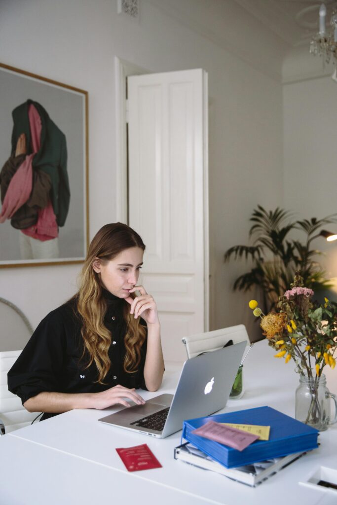 a virtual construction manager working remotely at her desk