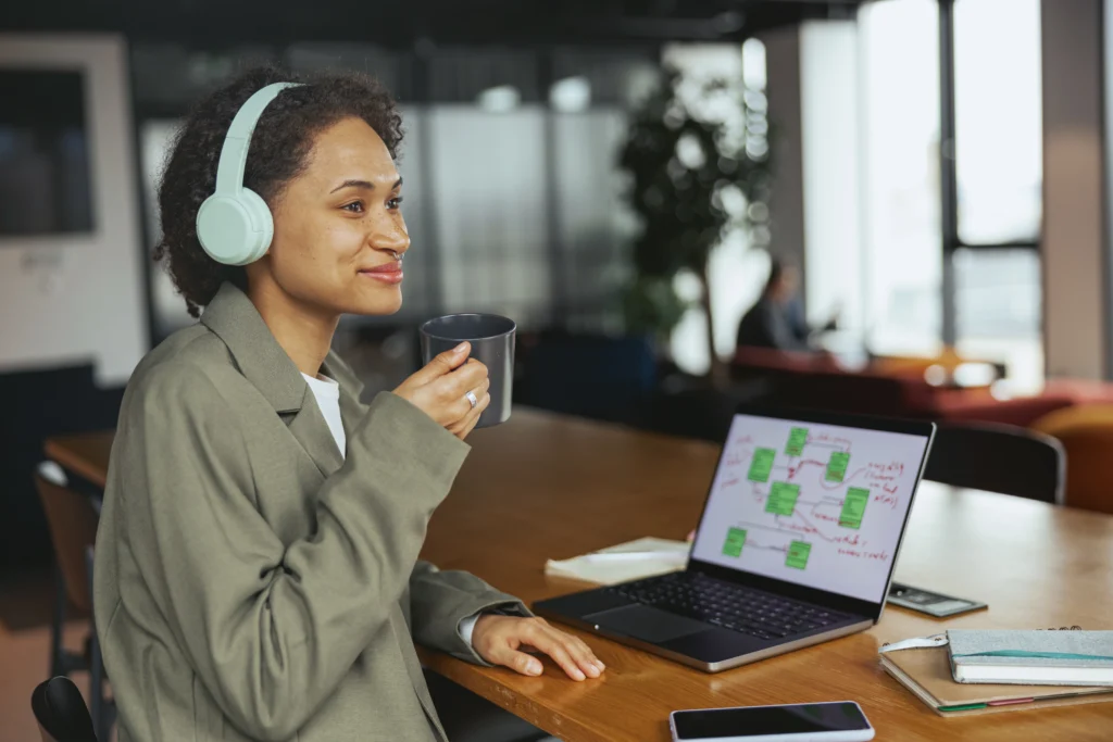 Young stylish woman working indoors