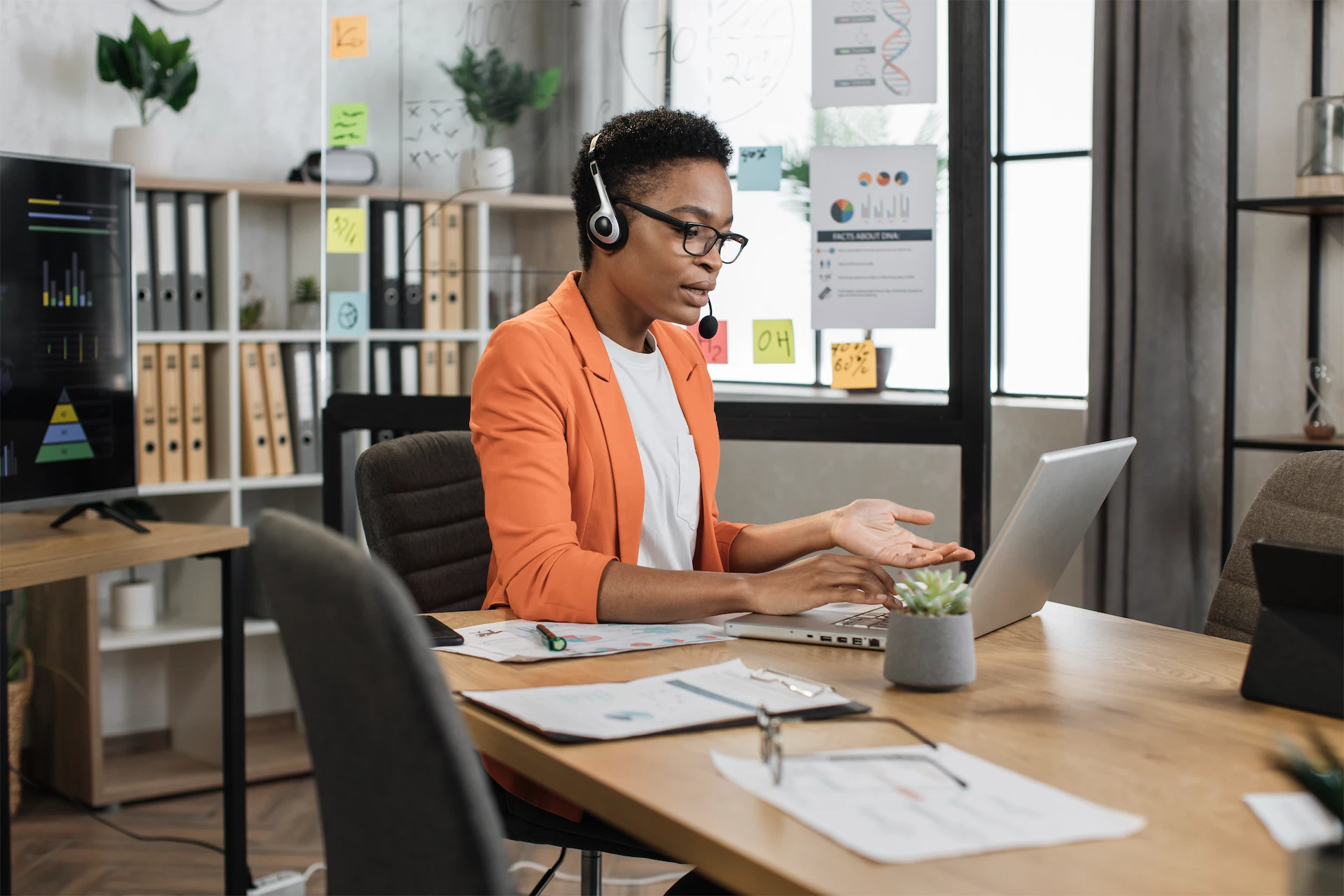 HVAC virtual assistant on headset presenting during laptop call