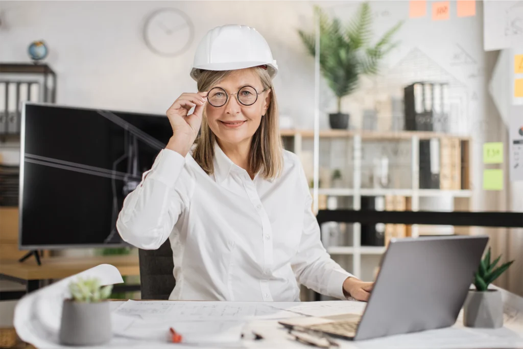 Virtual project manager working on her laptop at desk